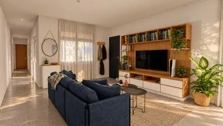 Living con mueble de TV y biblioteca a medida