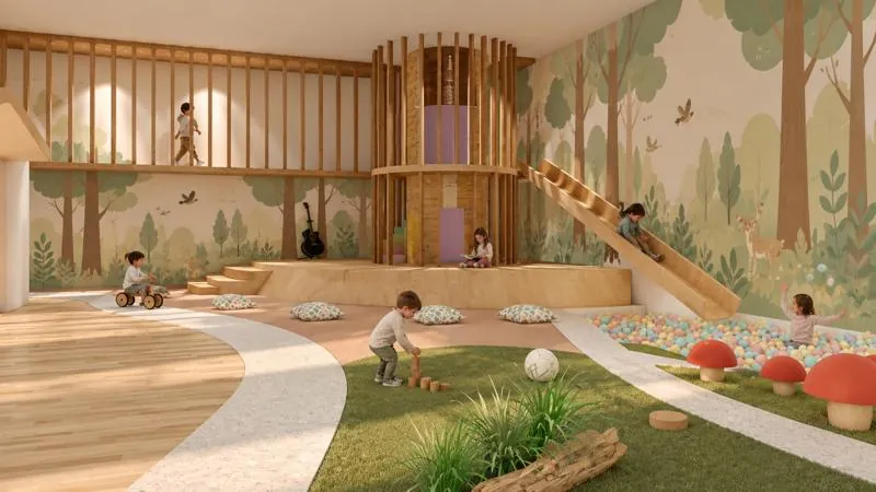 Paisajes de Aprendizaje — interior de la guardería con escenario y tobogán